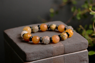 Golden Silk Jade Lotus Bead Bracelet