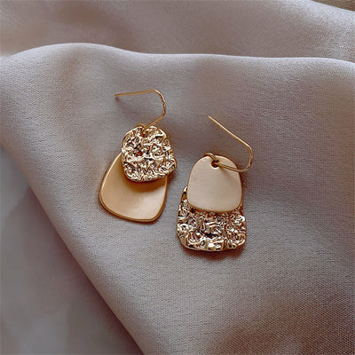 Asymmetric geometric earrings