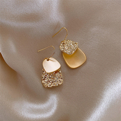 Asymmetric geometric earrings