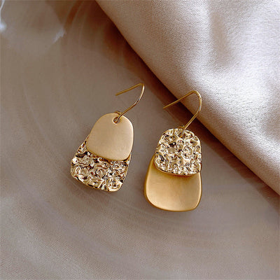 Asymmetric geometric earrings