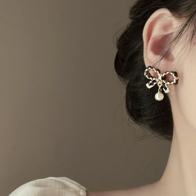 Bow natural freshwater pearl earrings