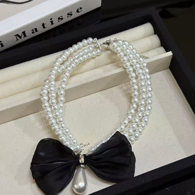Bow knot natural freshwater pearl drop necklace