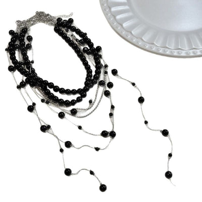 Multi-layered natural freshwater pearl tassel necklace