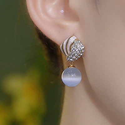 White natural cat's eye stone earrings