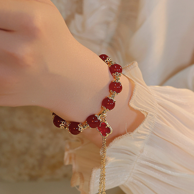 Four-leaf clover • Tassel Red agate bracelet