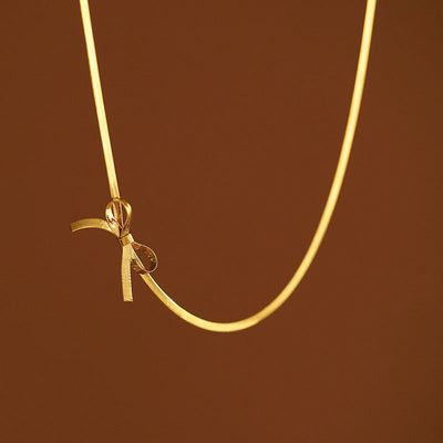 Snake bone chain bow necklace