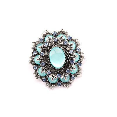 Vintage natural cat's eye stone brooch