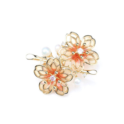 Orange floral brooch