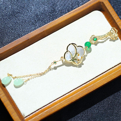 Natural shell tassel brooch