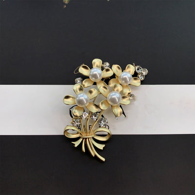 Gold December Birthday Flower Brooch
