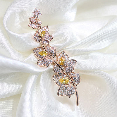 Yellow floral brooch