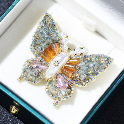 Butterfly faceted natural crystal brooch