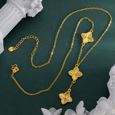 Three flowers and four-leaf clover necklace