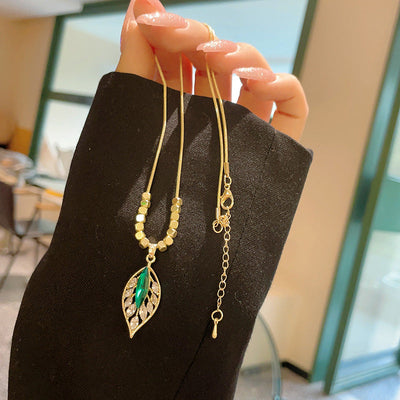 Zircon tree leaf pendant
