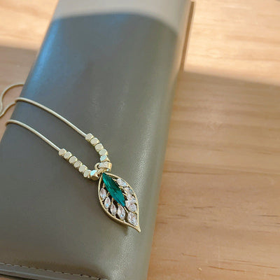 Zircon tree leaf pendant