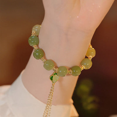 Four-leaf clover • Tassel Red agate bracelet