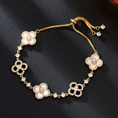 Four-leaf flower cluster • natural shell bracelet