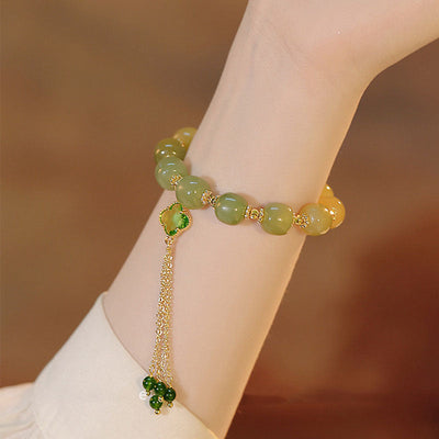 Four-leaf clover • Tassel Red agate bracelet