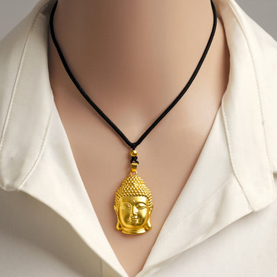 Gold Buddha head pendant necklace