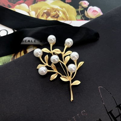 Gold December Birthday Flower Brooch