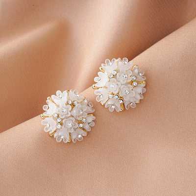 Three-dimensional flower earrings