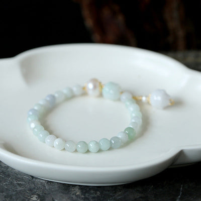 Emerald lotus bracelet