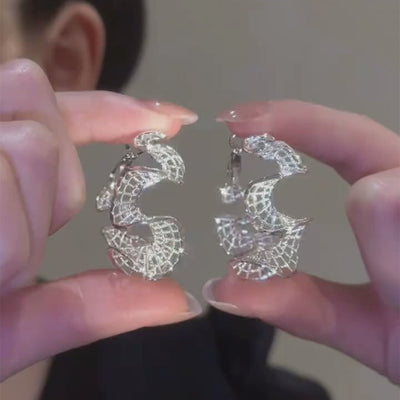 S-shaped curve earrings