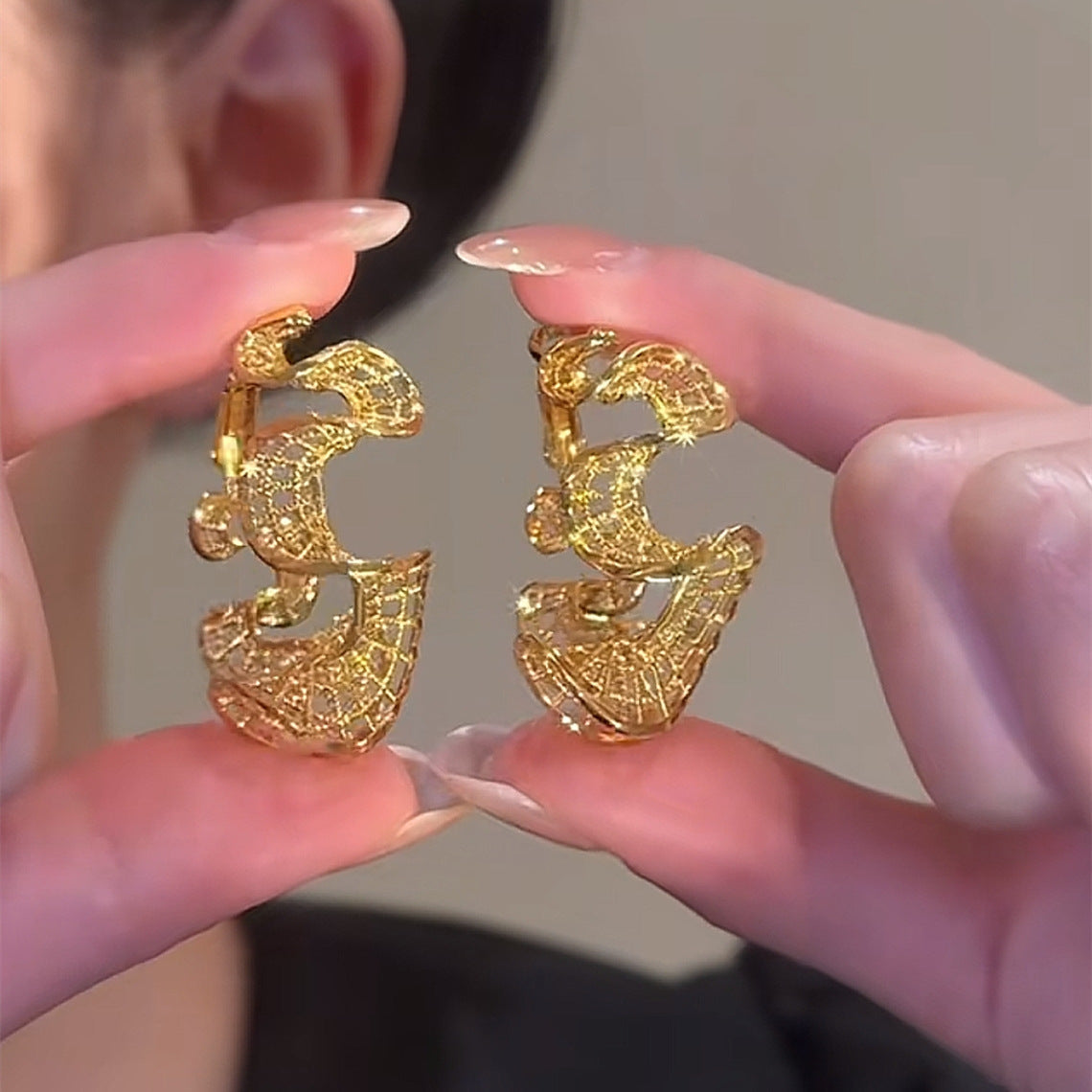 S-shaped curve earrings