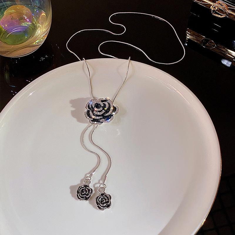Camellia sweater necklace