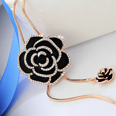 Camellia sweater necklace