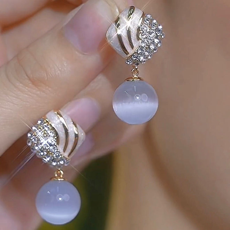 White natural cat's eye stone earrings