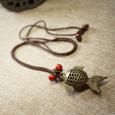 Bronze fish woven pendant