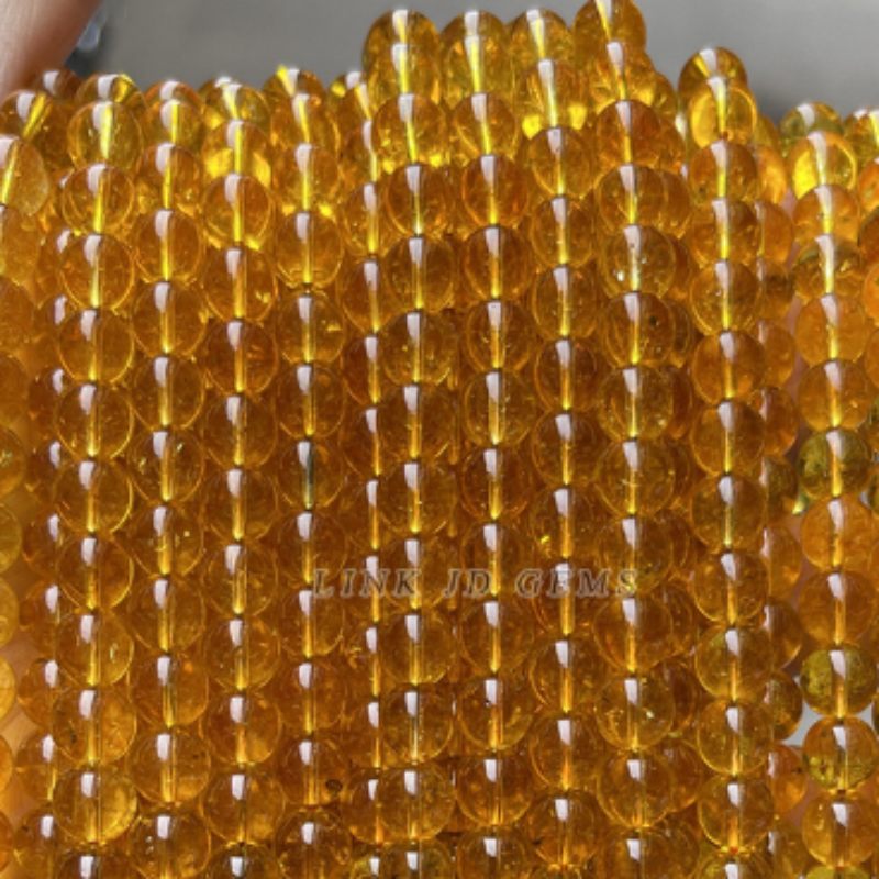 K9 citrine round beads
