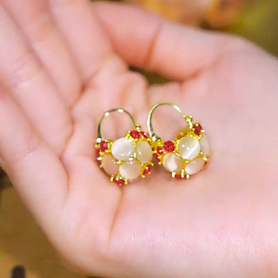 Natural cat's eye stone ball earrings