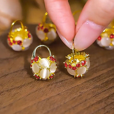 Natural cat's eye stone ball earrings