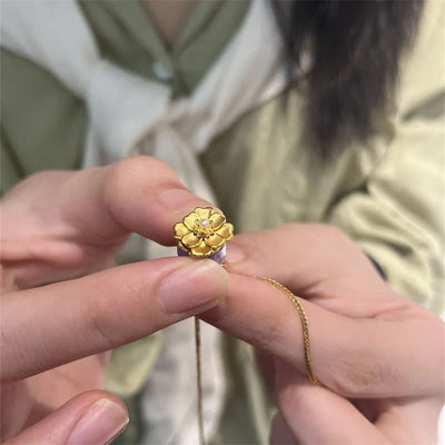 Golden rose pendant necklace