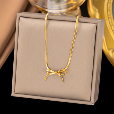 Snake bone chain bow necklace