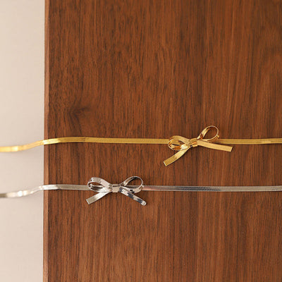 Snake bone chain bow necklace