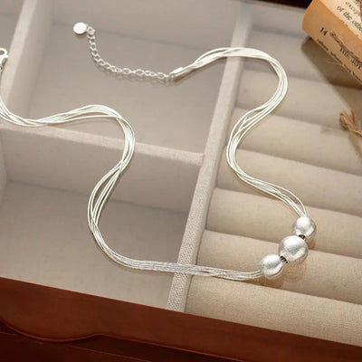 Streamer cat's eye necklace