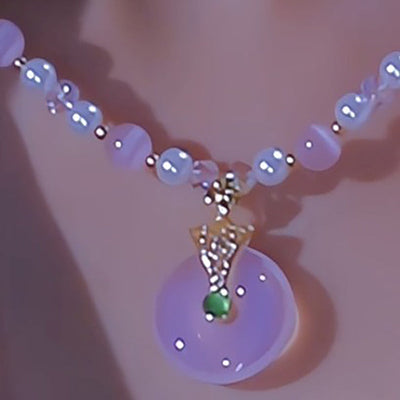 Pink cat's eye stone peace buckle necklace