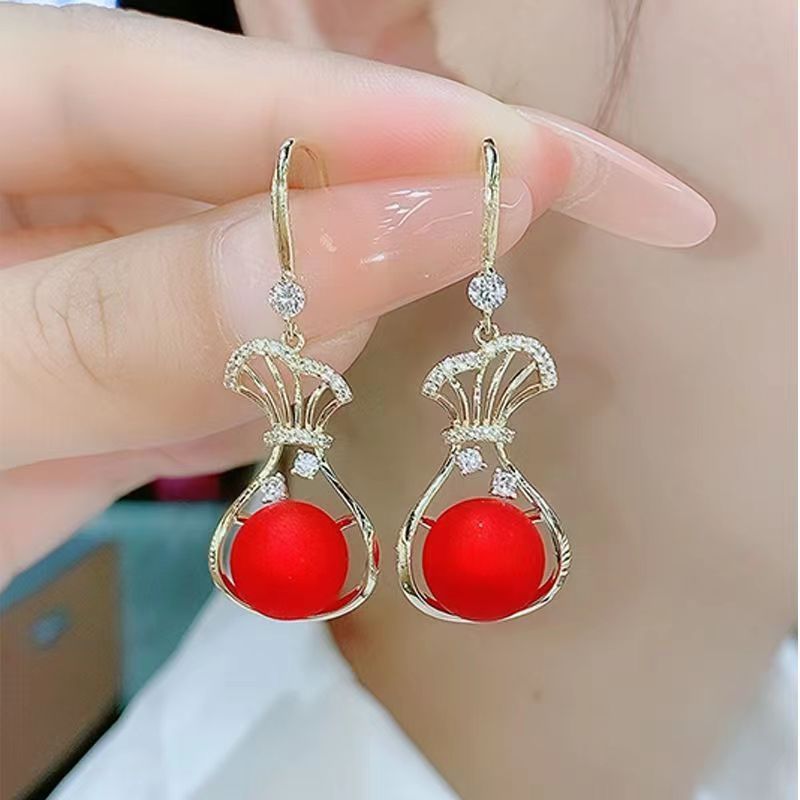 Money bag micropaved zircon stud earrings