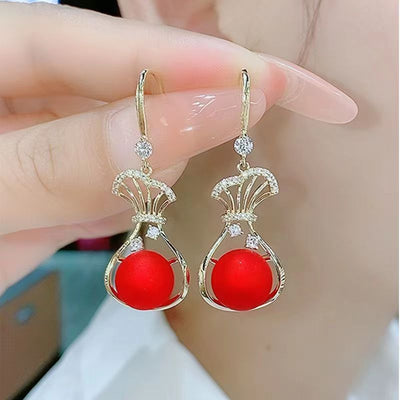 Money bag micropaved zircon stud earrings