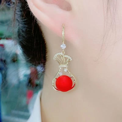 Money bag micropaved zircon stud earrings