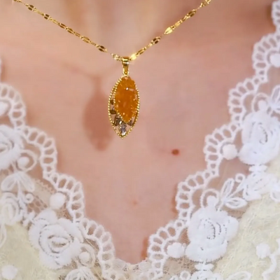 Natural crystal necklace with leaf pendant
