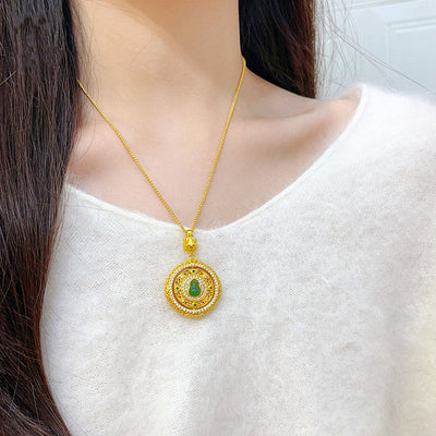 Filigree peace buckle gourd compass necklace