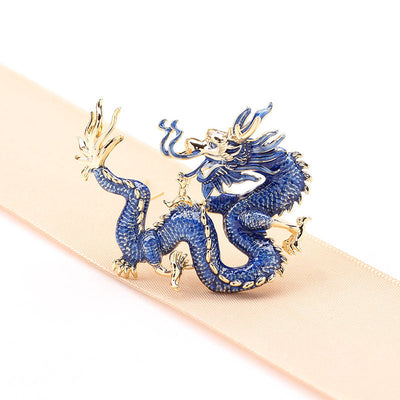 Flying golden dragon brooch