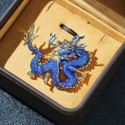 Flying golden dragon brooch