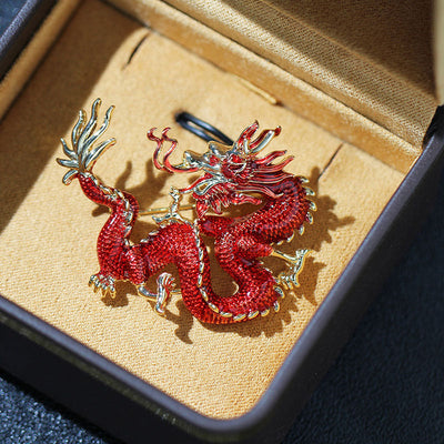 Flying golden dragon brooch