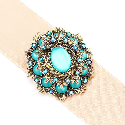 Vintage natural cat's eye stone brooch