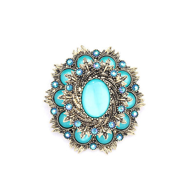 Vintage natural cat's eye stone brooch